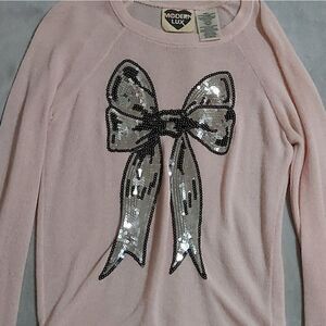 pastel pink sweater